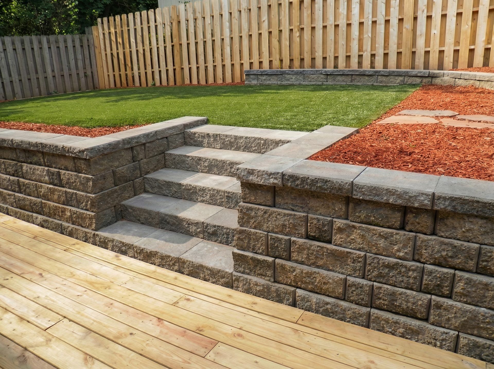 Block retaining wall with steps