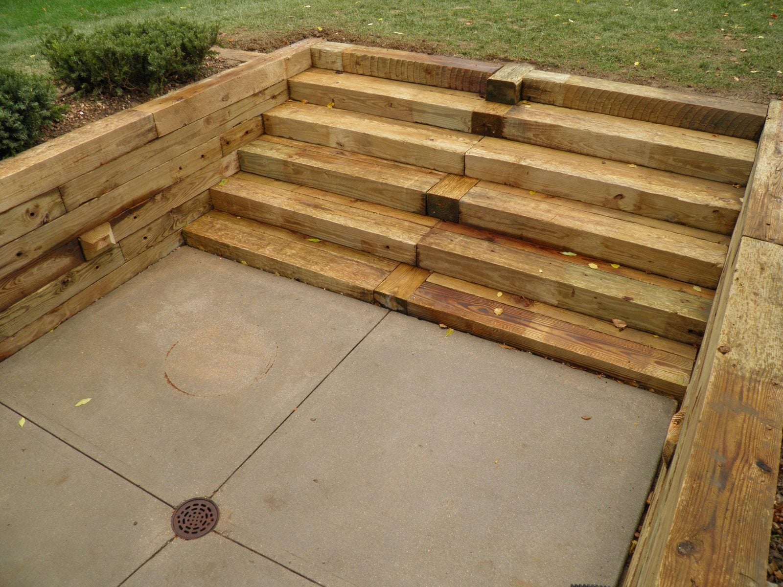 Timber wall with steps and patio